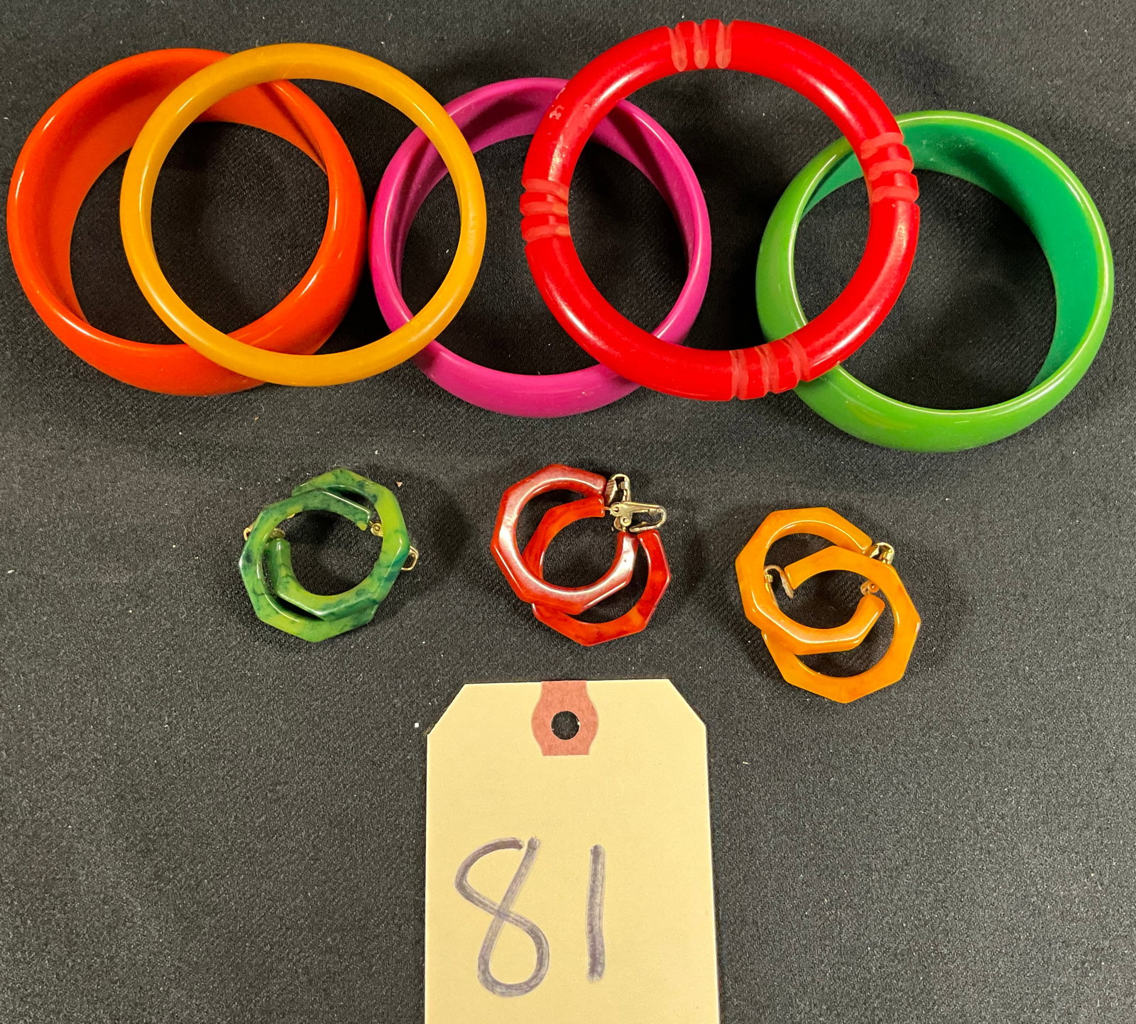8 PC BAKELITE BRACLETS AND EARRINGS.: 8 PC BAKELITE BRACLETS AND EARRINGS. Condition All property is sold in "as is" condition and all sales are final. Teel Auctions and its consignor make no representations or warranties, express or impl