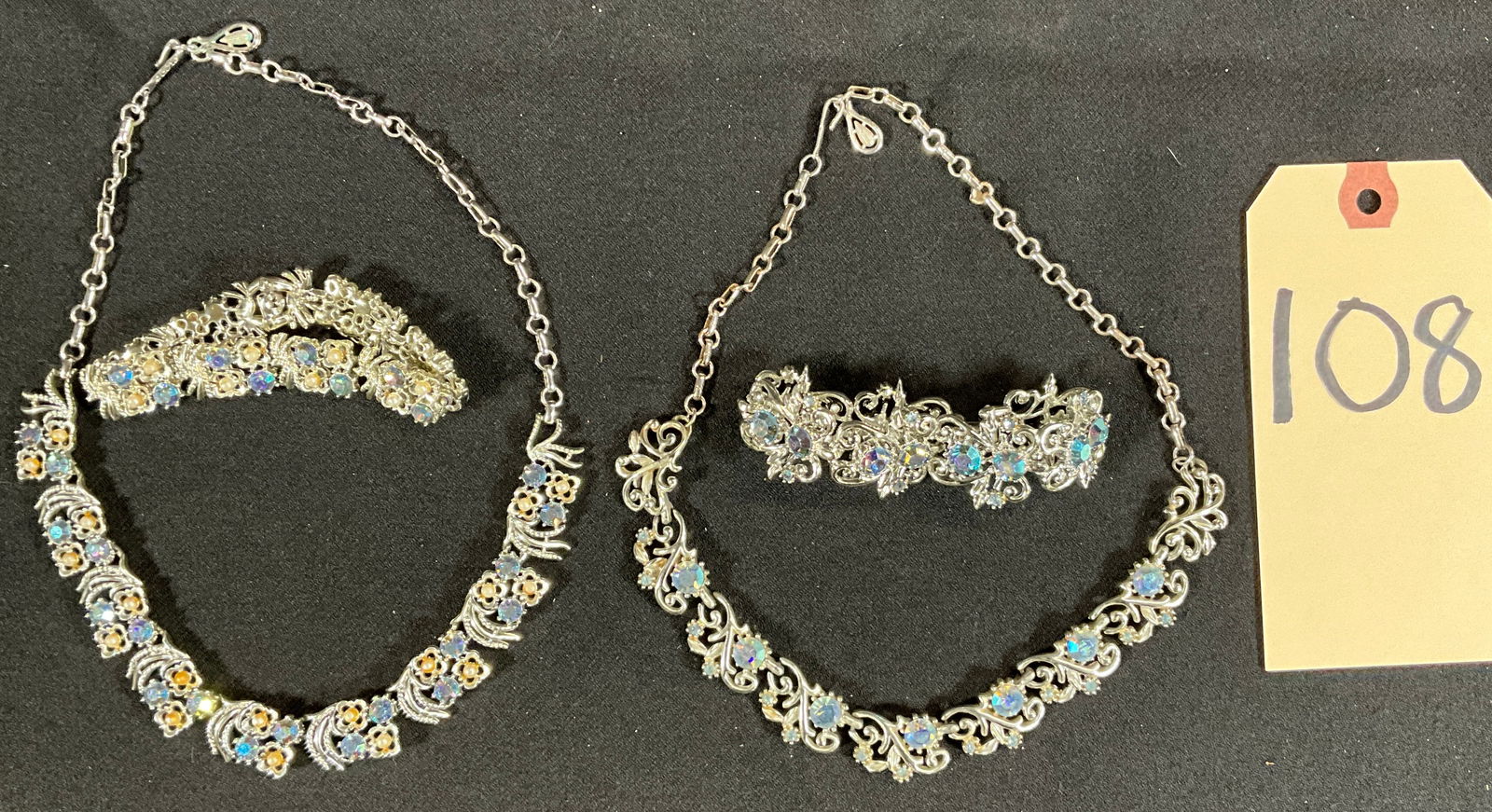 2 CORO GEM ENCRUSTED NECKLACE AND BRACELET SETS.: 2 CORO GEM ENCRUSTED NECKLACE AND BRACELET SETS. BRACELETS ARE 7" AND NECKLACE IS 16". Condition All property is sold in "as is" condition and all sales are final. Teel Auctions and its consignor make