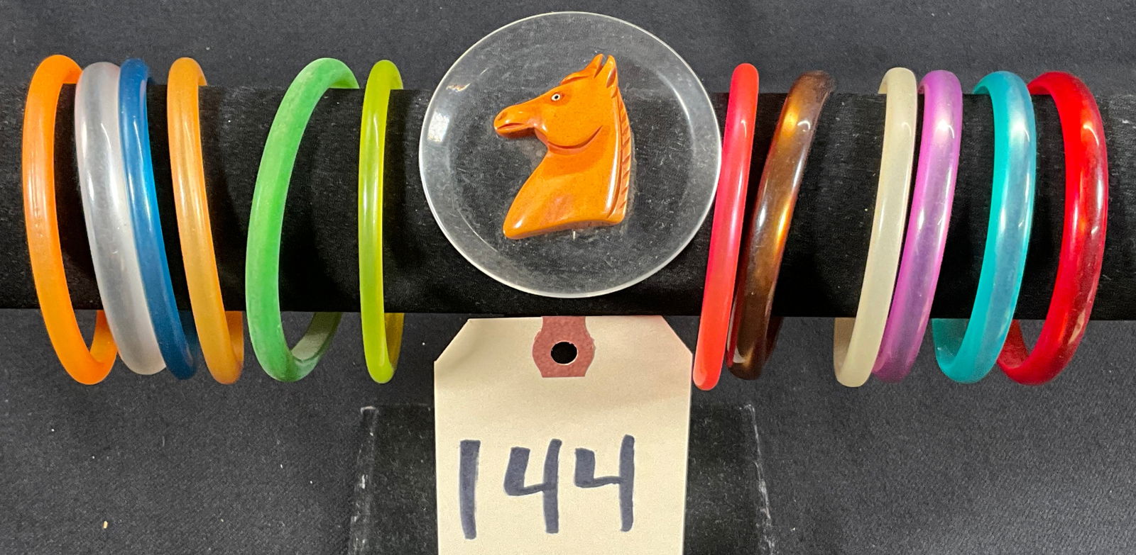 13 PC MULTI COLORED BRACELETS WITH HORSE HEAD PIN. (1 of 3)