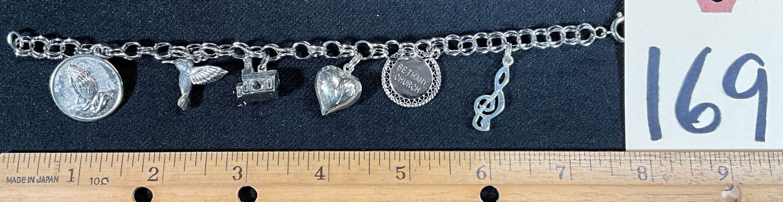 7" STERLING SILVER CHARM BRACELET. (1 of 4)