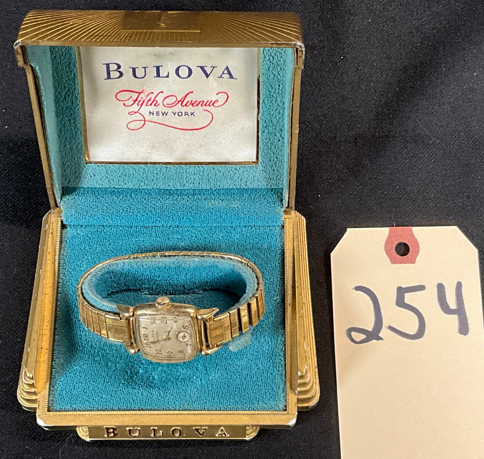 VINTAGE BULOVA WATCH WITH ORIGINAL WATCHCASE AND SPEIDEL WATCH BAND.: VINTAGE BULOVA WATCH WITH ORIGINAL WATCHCASE AND SPEIDEL WATCH BAND. UNKNOWN OPERABILITY. Condition All property is sold in "as is" condition and all sales are final. Teel Auctions and its consignor m