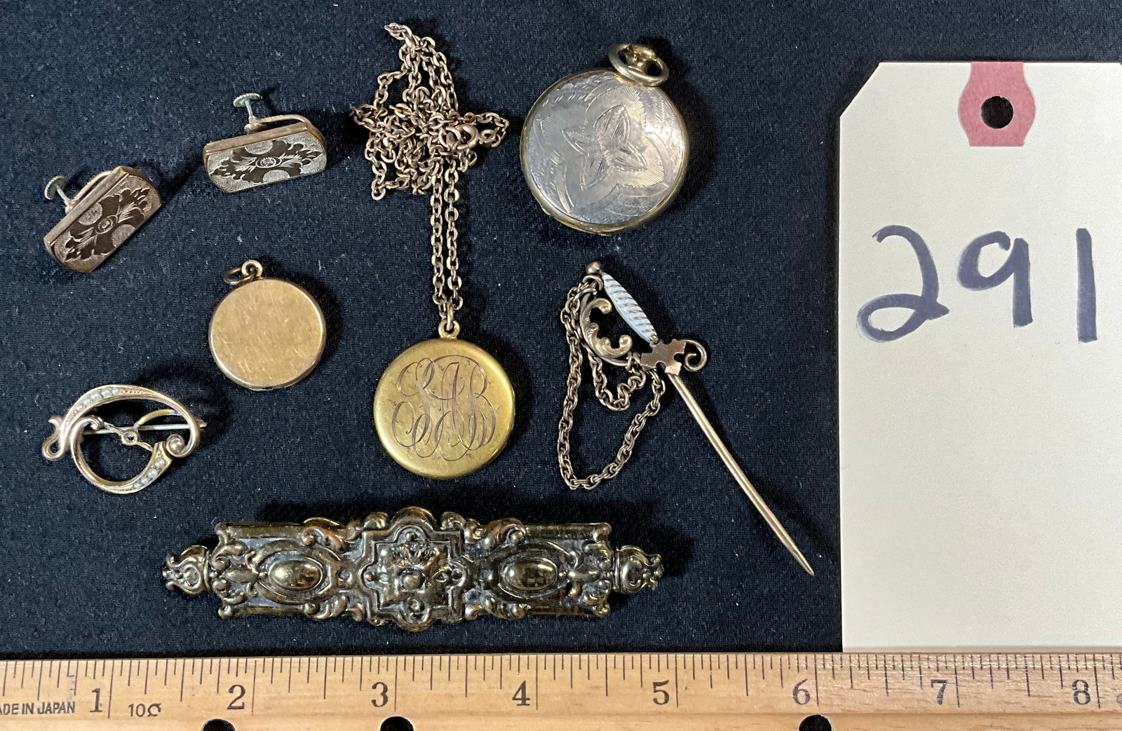 8 PC VINTAGE LOCKETS, EARRINGS, BROOCHES, AND SWORD.: 8 PC VINTAGE LOCKETS, EARRINGS, BROOCHES, AND SWORD. Condition All property is sold in "as is" condition and all sales are final. Teel Auctions and its consignor make no representations or warranties,