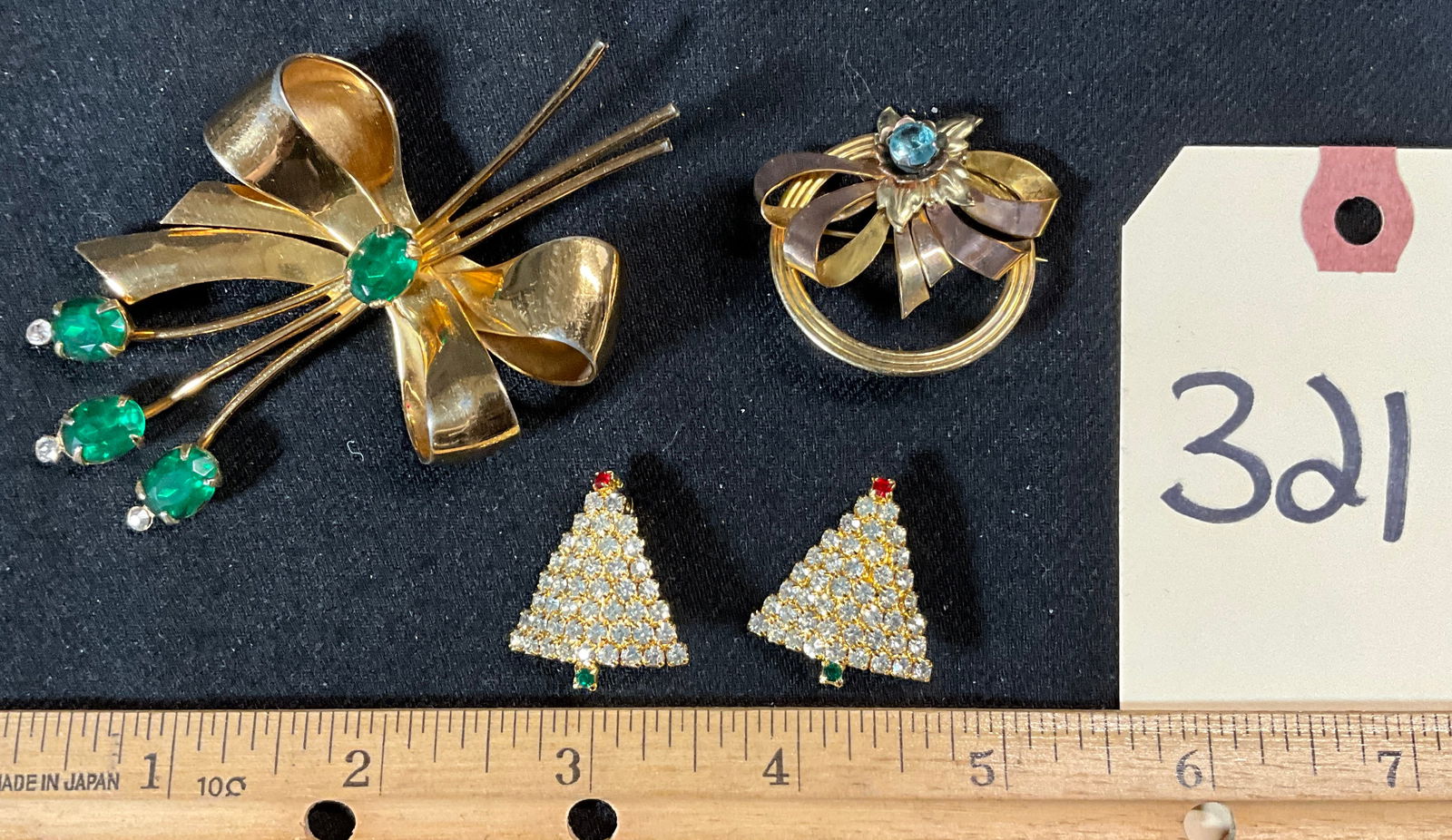 GOLD FILLED AND MORE BROOCHES FROM TOMMY HILFIGER, CORO, AND MORE.: GOLD FILLED AND MORE BROOCHES FROM TOMMY HILFIGER, CORO, AND MORE. Condition All property is sold in "as is" condition and all sales are final. Teel Auctions and its consignor make no representations