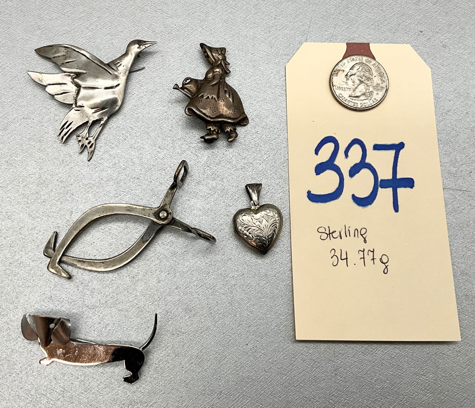 5 PC STERLING SILVER BROOCHES, PENDANT, AND SILVER PLATED ICE TONGS. TOTAL 34.77 GRAMS. (1 of 4)