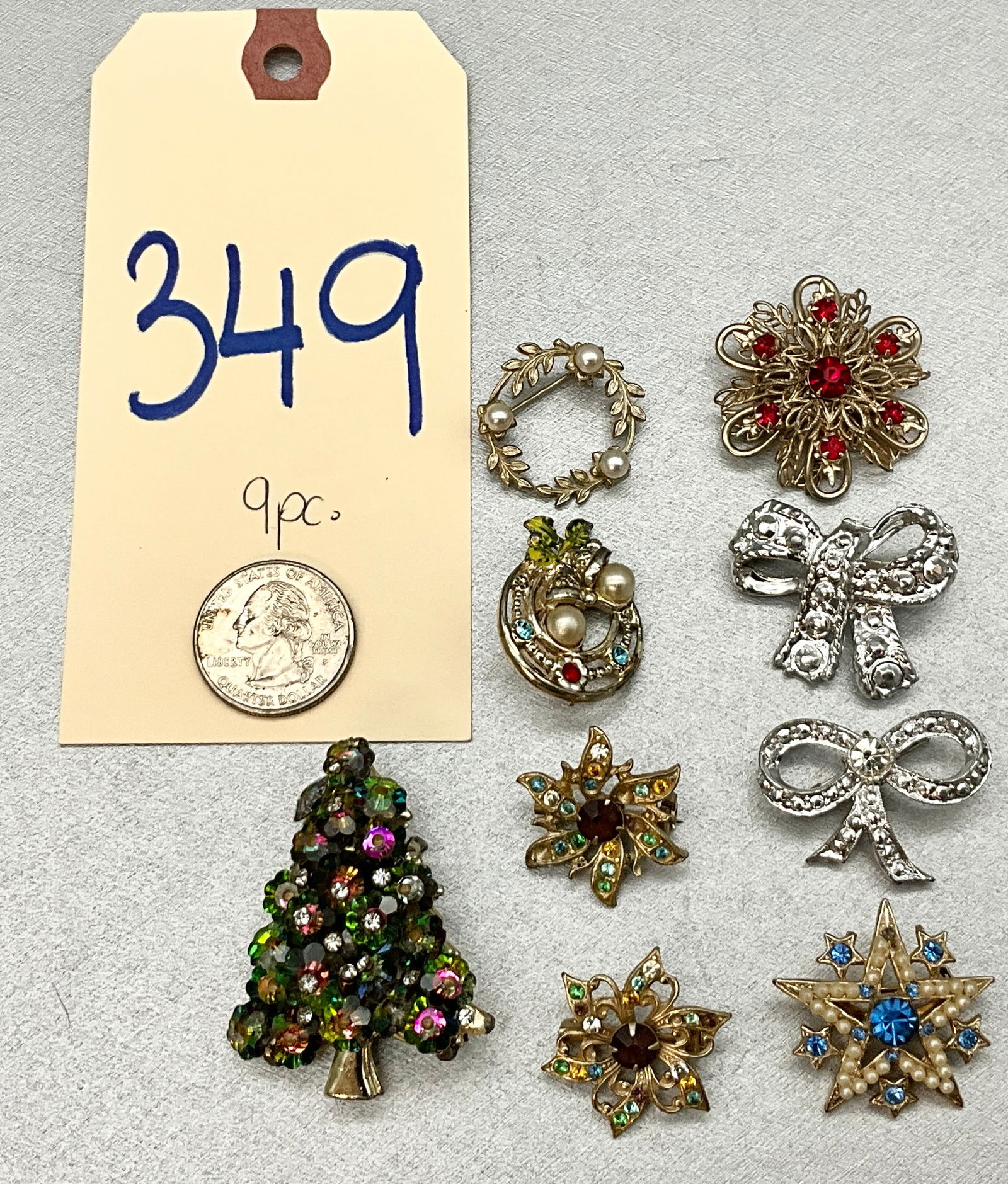 9 PC GEMSTONE ENCRUSTED HOLIDAY JEWELRY.: 9 PC GEMSTONE ENCRUSTED HOLIDAY JEWELRY. ONE MARKED STRAUSS, CORO, AND OTHERS Condition All property is sold in "as is" condition and all sales are final. Teel Auctions and its consignor make no repre