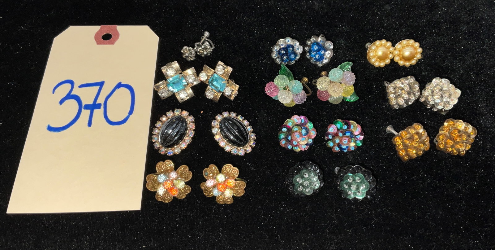 11 SETS OF ASSORTED EARRINGS.: 11 SETS OF ASSORTED EARRINGS. Condition All property is sold in "as is" condition and all sales are final. Teel Auctions and its consignor make no representations or warranties, express or implied, wi
