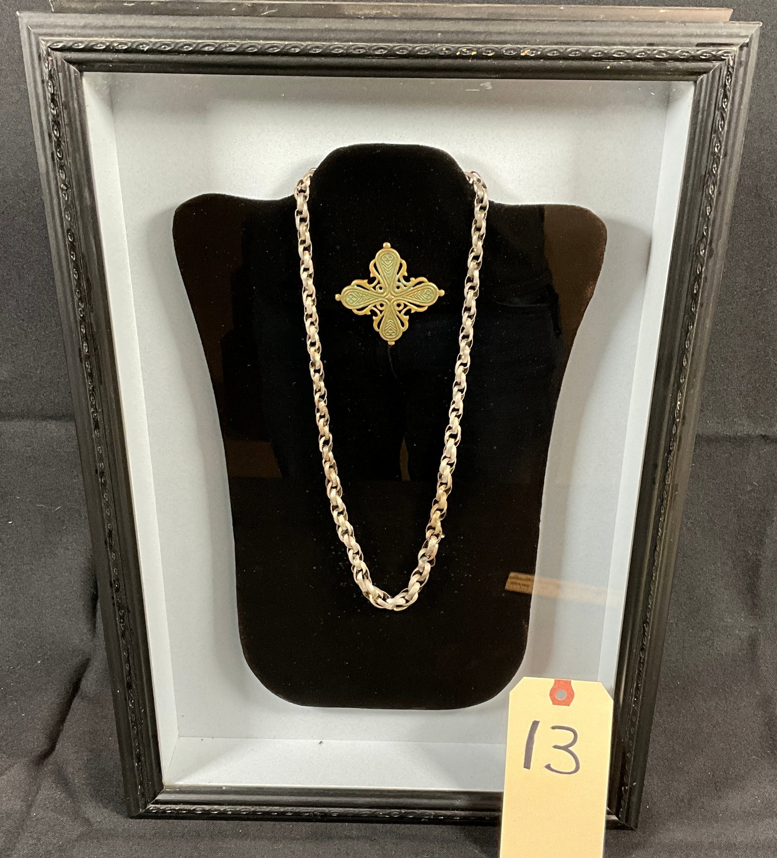 FRAMED VIKING NECKLACE AND CROSS PIN WITH PROVENANCE.: FRAMED VIKING NECKLACE AND CROSS PIN WITH PROVENANCE. FRAME MEASURES 13" X 19". Condition All property is sold in "as is" condition and all sales are final. Teel Auctions and its consignor make no rep