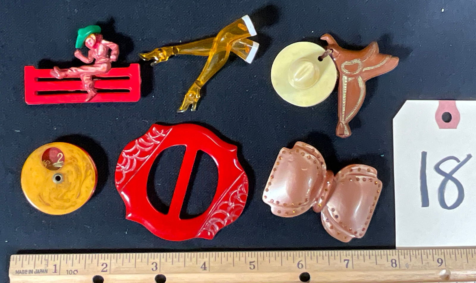 6 PC WESTERN AND ASIAN BAKELITE, CELLULOID, AND MORE BROOCHES/ETC. (1 of 3)
