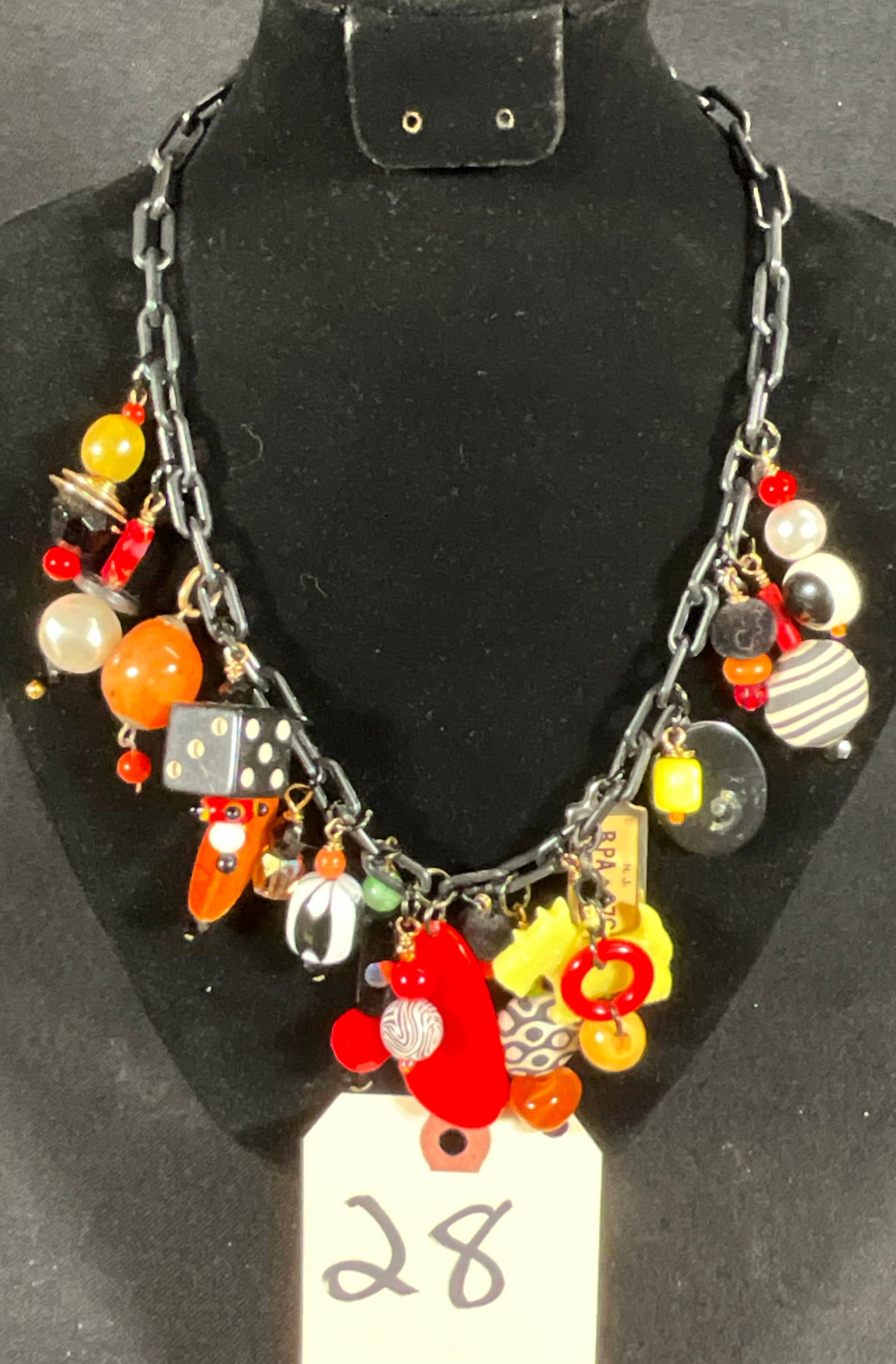 20" MIXED MEDIA CHARM NECKLACE.: 20" MIXED MEDIA CHARM NECKLACE. Condition All property is sold in "as is" condition and all sales are final. Teel Auctions and its consignor make no representations or warranties, express or implied, 