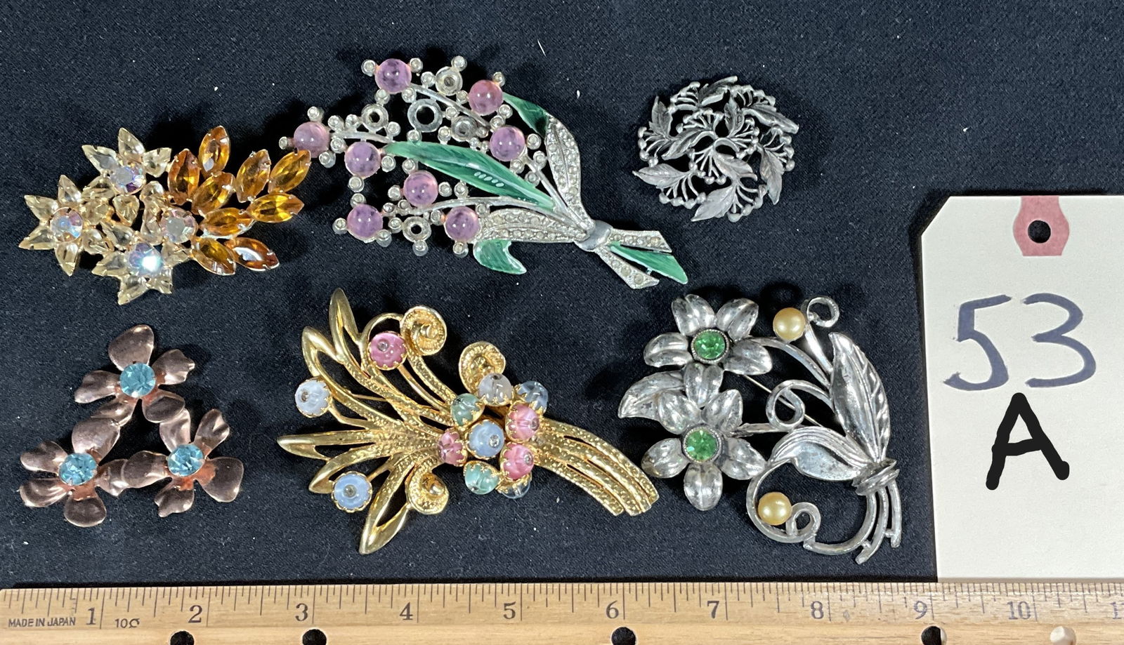 6 PC ASSORTED FLORAL GEMSTONE ENCRUSTED BROOCHES. (1 of 6)