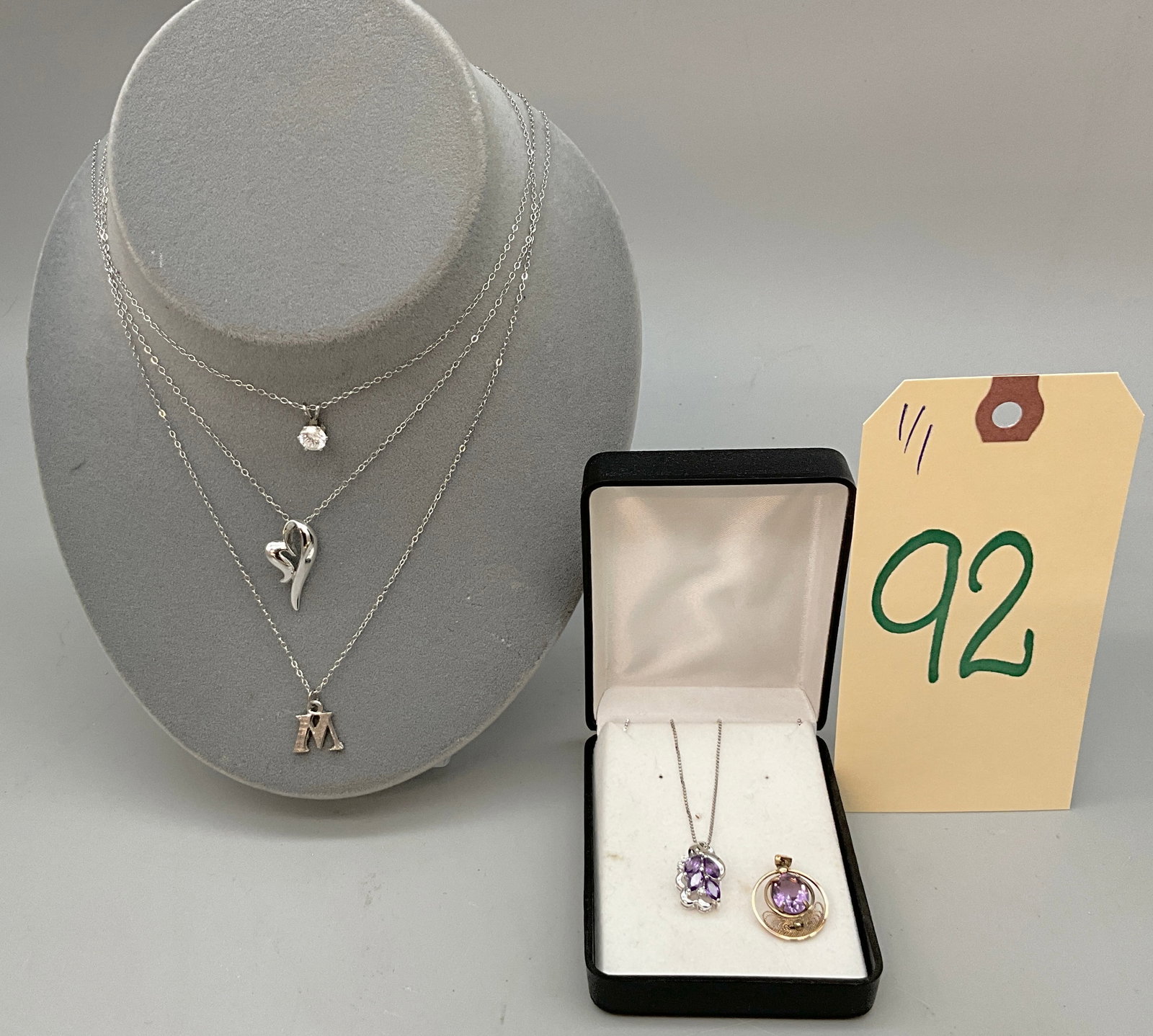 STERLING SILVER NECKLACES WITH PENDANTS.: STERLING SILVER NECKLACES WITH PENDANTS. INCLUDES ONE GOLD FILLED AMETHYST PENDANT. Condition All property is sold in "as is" condition and all sales are final. Teel Auctions and its consignor make no