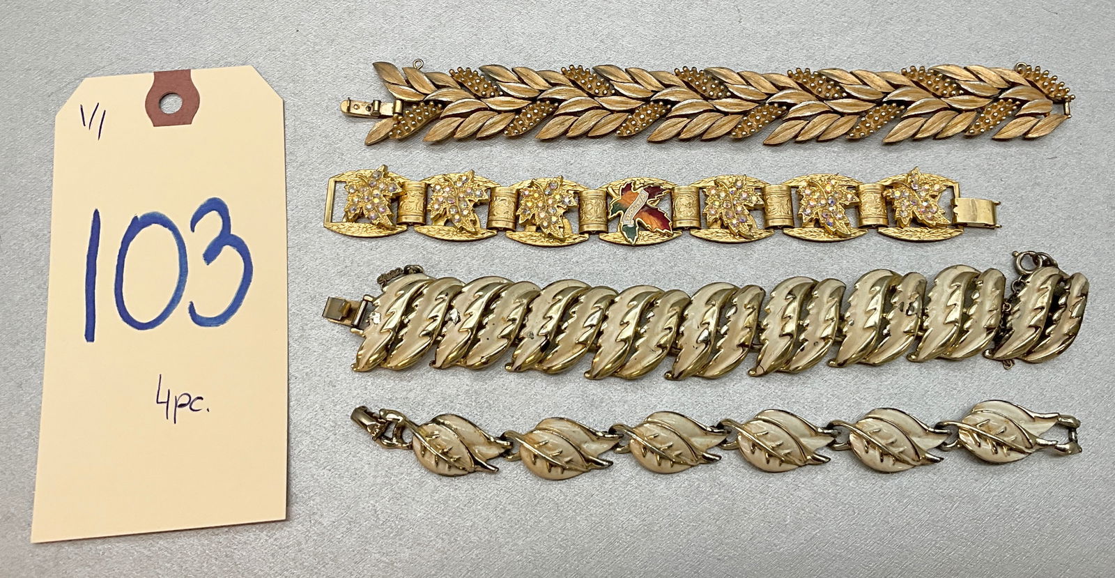4 PC LEAF MOTIF BRACELETS FROM TRIFARI, CORO, AND OTHERS.: 4 PC LEAF MOTIF BRACELETS FROM TRIFARI, CORO, AND OTHERS. Condition All property is sold in "as is" condition and all sales are final. Teel Auctions and its consignor make no representations or warran