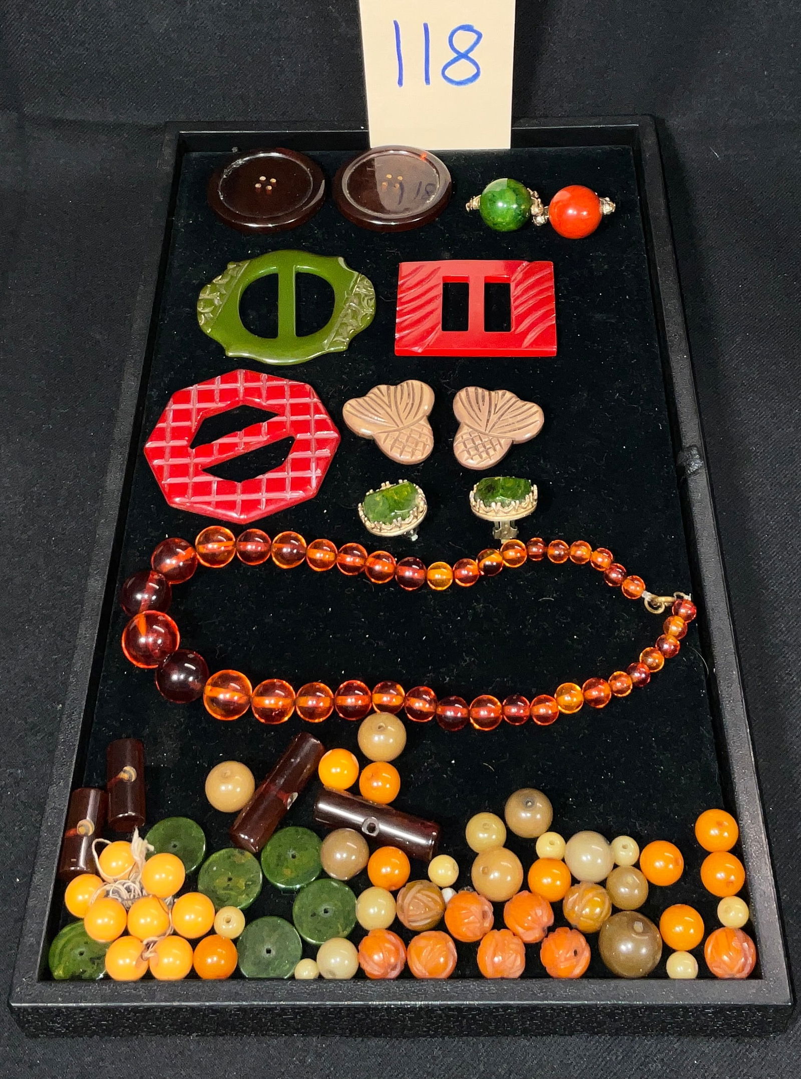 ASSORTED BAKELITE AND MORE BELT BUCKLES, BEADS, BUTTONS, AND MORE. (1 of 5)