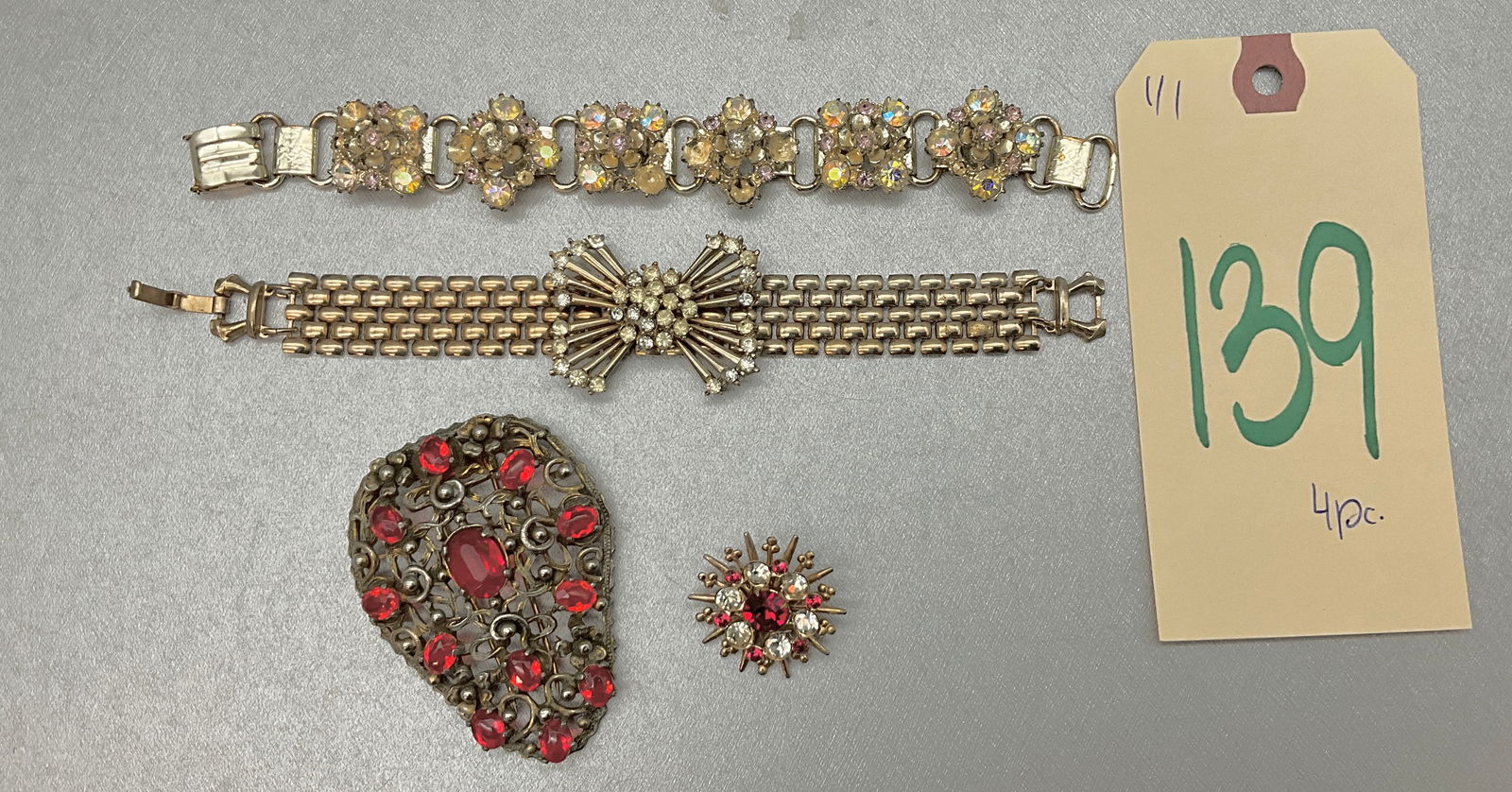 4 PC RHINESTONE DECORATED PIN, BRACELETS, AND DRESS CLIP. (1 of 6)