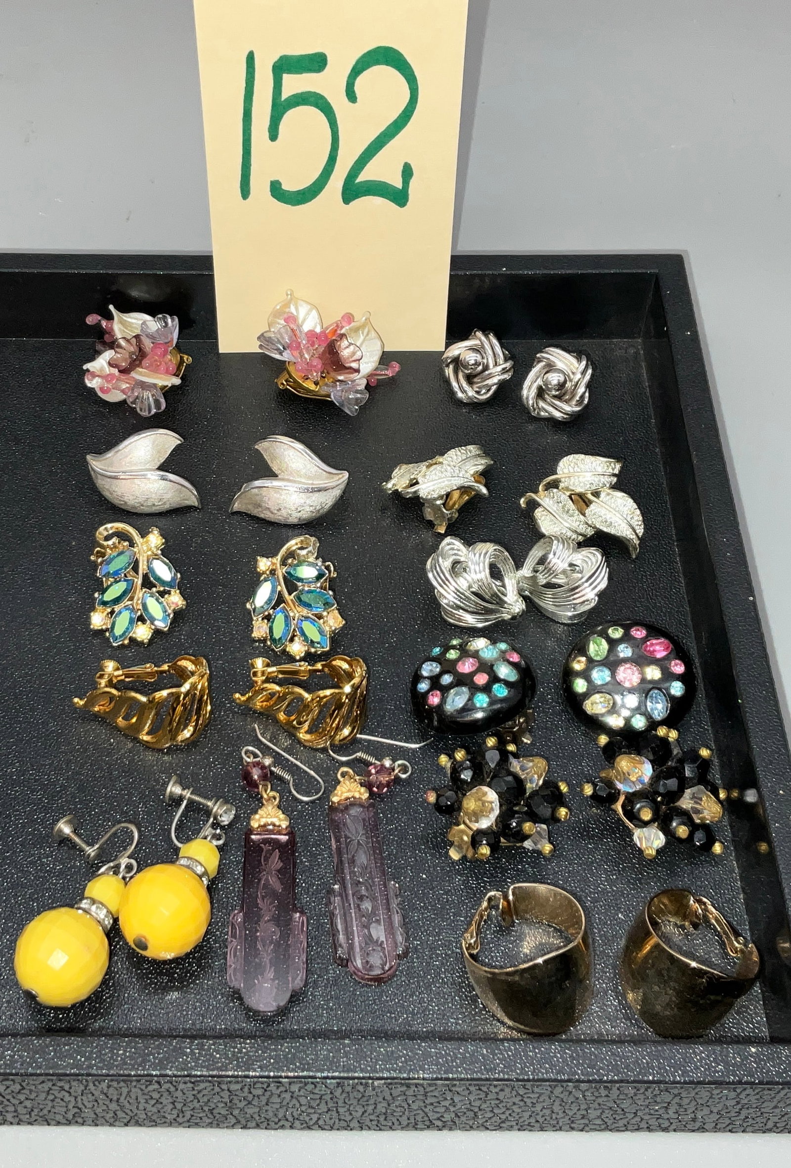 12 PAIR OF ASSORTED MIXED MEDIA EARRINGS.: 12 PAIR OF ASSORTED MIXED MEDIA EARRINGS. NAMES FROM TRIFARI, NAPIER, AND OTHERS. Condition All property is sold in "as is" condition and all sales are final. Teel Auctions and its consignor make no r