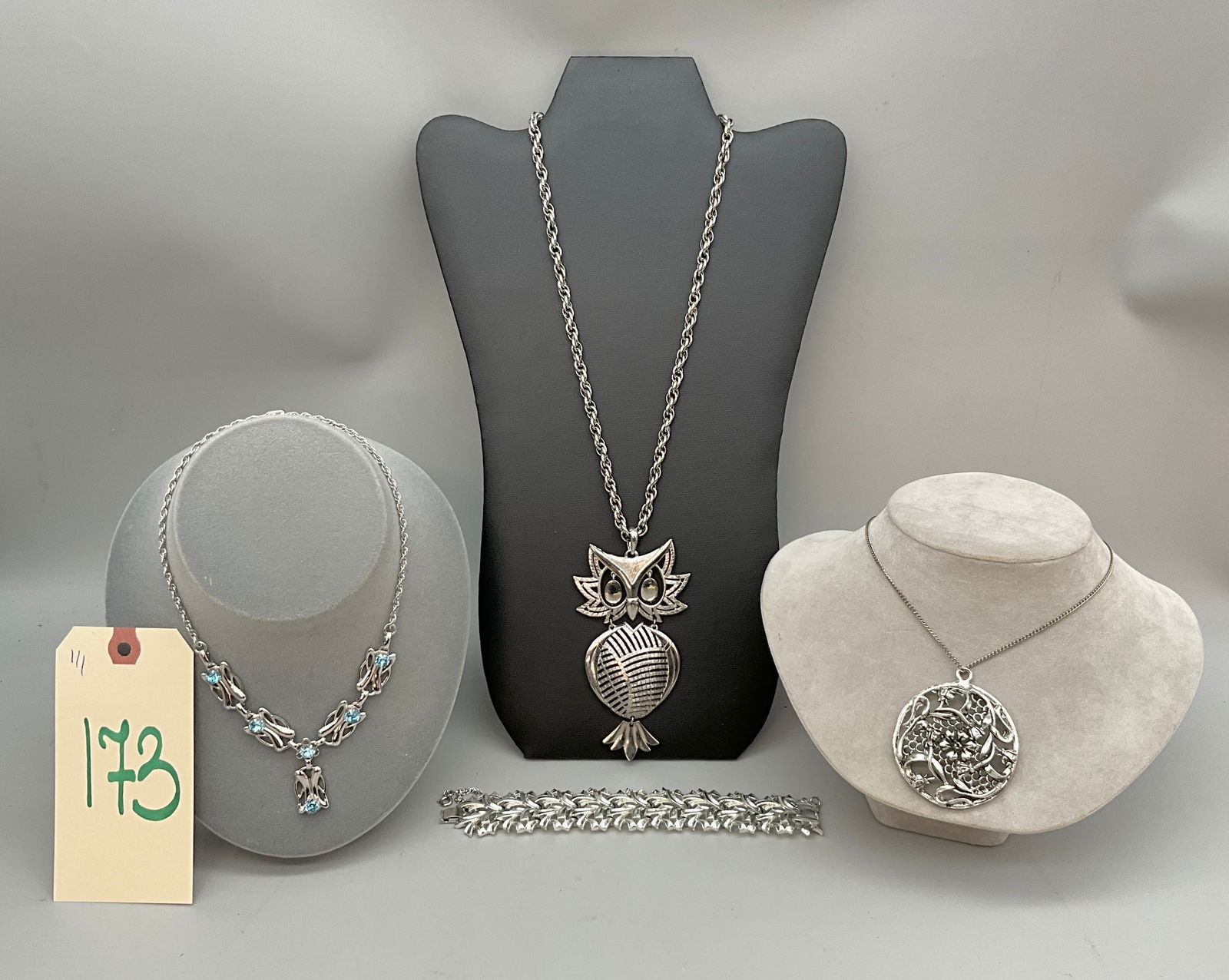 4 PC DECORATED NECKLACES AND BRACELET WITH OWN PENDANT AND MORE.: 4 PC DECORATED NECKLACES AND BRACELET WITH OWN PENDANT AND MORE. MARKED CORO, ALAN, AND MORE. NECKLACES MEASURE FROM 14" TO 21"L Condition All property is sold in "as is" condition and all sales are f
