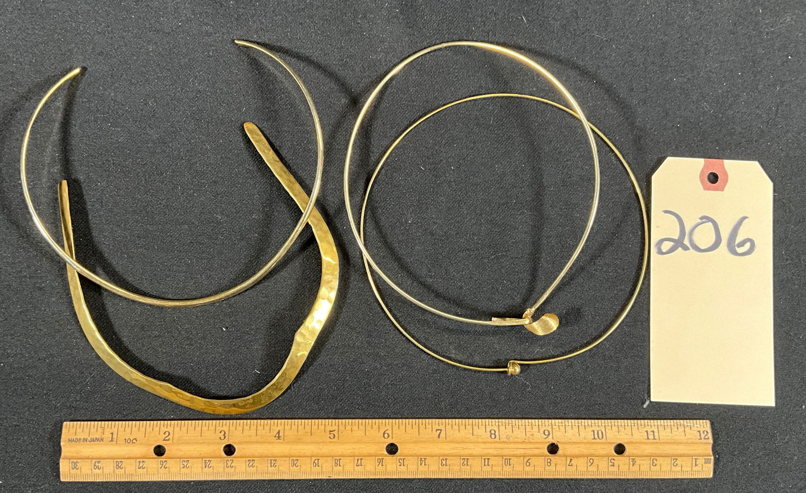 4 P BRASS COLORED HOOP NECKLACES. (1 of 2)