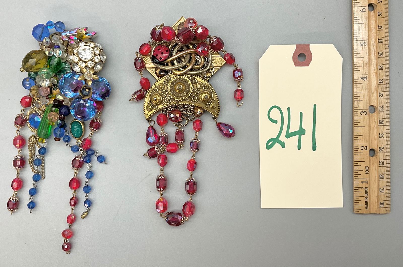 PAIR OF SARAH JANE SIGNED MIXED MEDIA MOSAIC FASHION BROOCHES. (1 of 3)