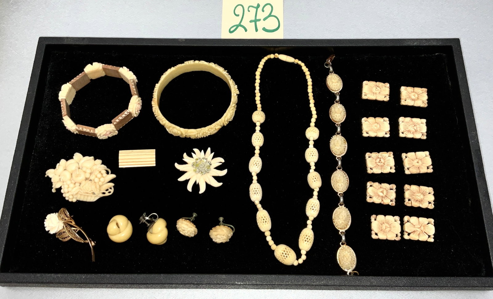 23 PC BONE AND COMPOSITE JEWELRY LOT.: 23 PC BONE AND COMPOSITE JEWELRY LOT. LOT INCLUDES 16" NECKLACE, PINS, EARRINGS, BRACLETS, AND MORE. Condition All property is sold in "as is" condition and all sales are final. Teel Auctions and its 