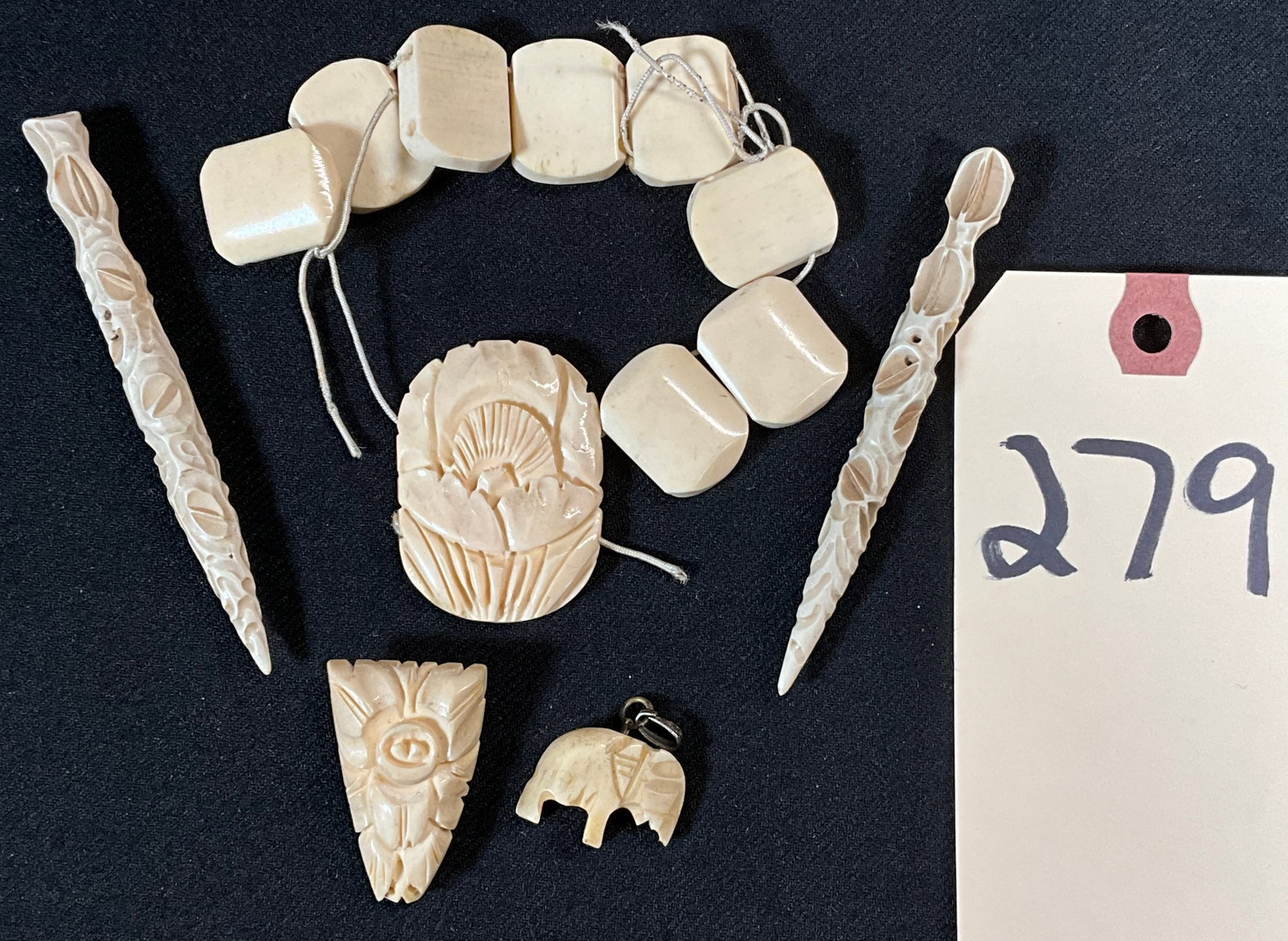 5 PC CARVED BONE JEWELRY AND CARVINGS.: 5 PC CARVED BONE JEWELRY AND CARVINGS. Condition All property is sold in "as is" condition and all sales are final. Teel Auctions and its consignor make no representations or warranties, express or im