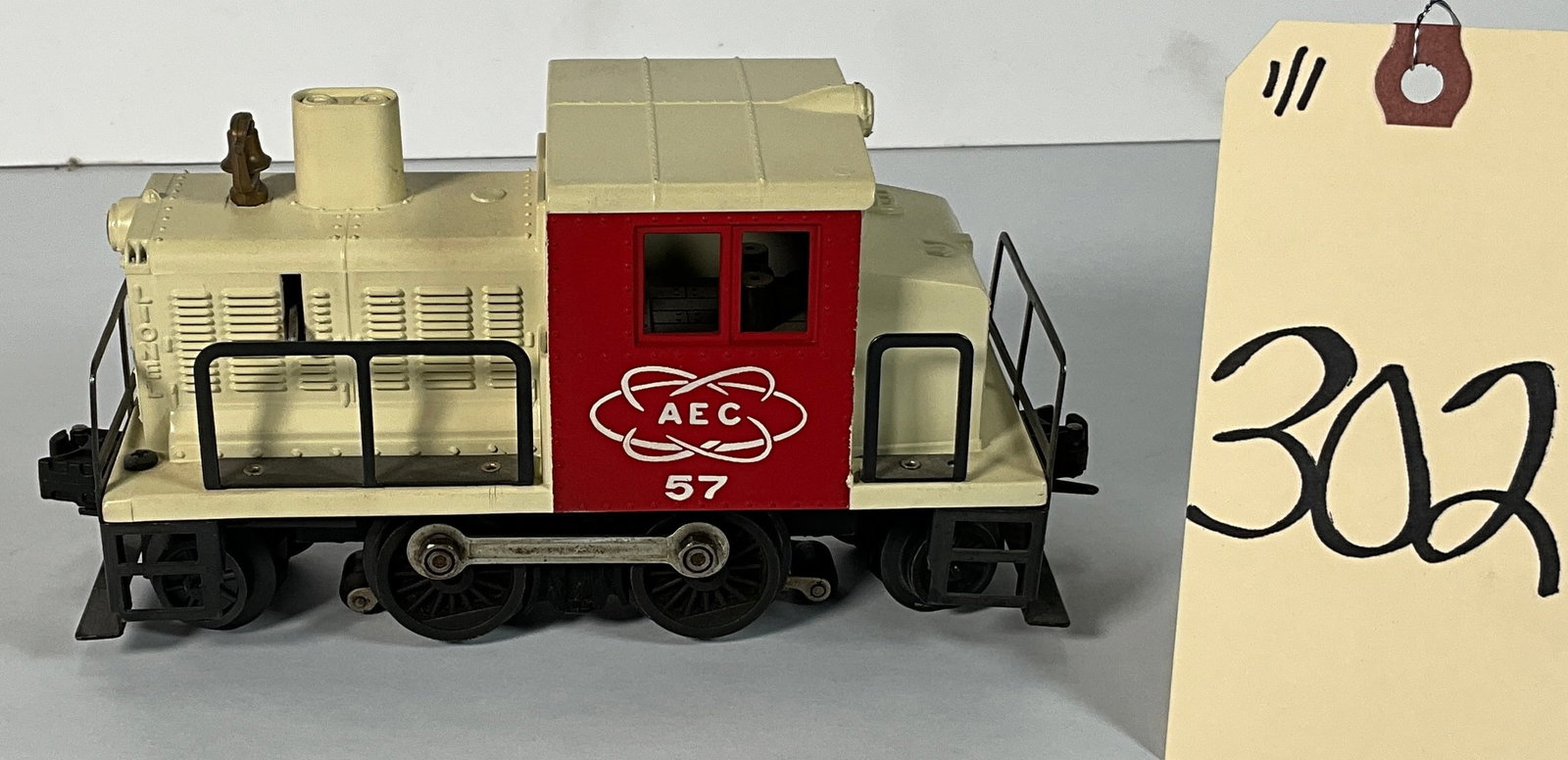 LIONEL EAC SWITCHER UNIT NO 57 CREAM AND RED.: LIONEL EAC SWITCHER UNIT NO 57 CREAM AND RED. Condition All property is sold in "as is" condition and all sales are final. Teel Auctions and its consignor make no representations or warranties, expres