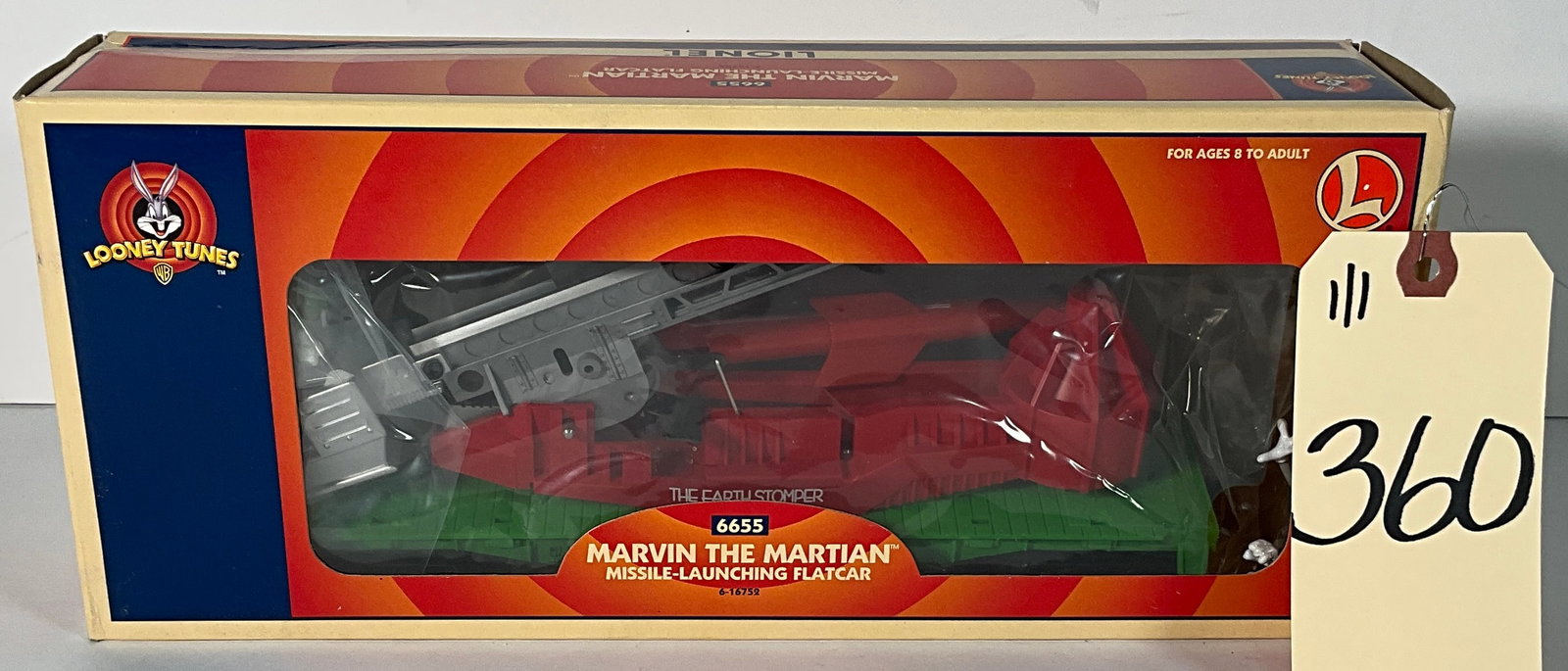 LIONEL 6655 MARVIN THE MARTIAN MISSLE-LAUNCHING FLAT CAR WITH BOX.: LIONEL 6655 MARVIN THE MARTIAN MISSLE-LAUNCHING FLAT CAR WITH BOX. Condition All property is sold in "as is" condition and all sales are final. Teel Auctions and its consignor make no representations 