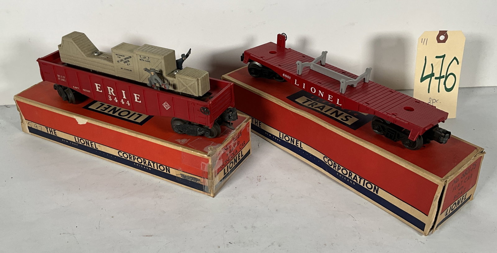 2 PC LIONEL 3444 ANIMATED GONDOLA CAR AND 6801 FLATCAR, NO BOAT.: 2 PC LIONEL 3444 ANIMATED GONDOLA CAR AND 6801 FLATCAR, NO BOAT. Condition All property is sold in "as is" condition and all sales are final. Teel Auctions and its consignor make no representations or