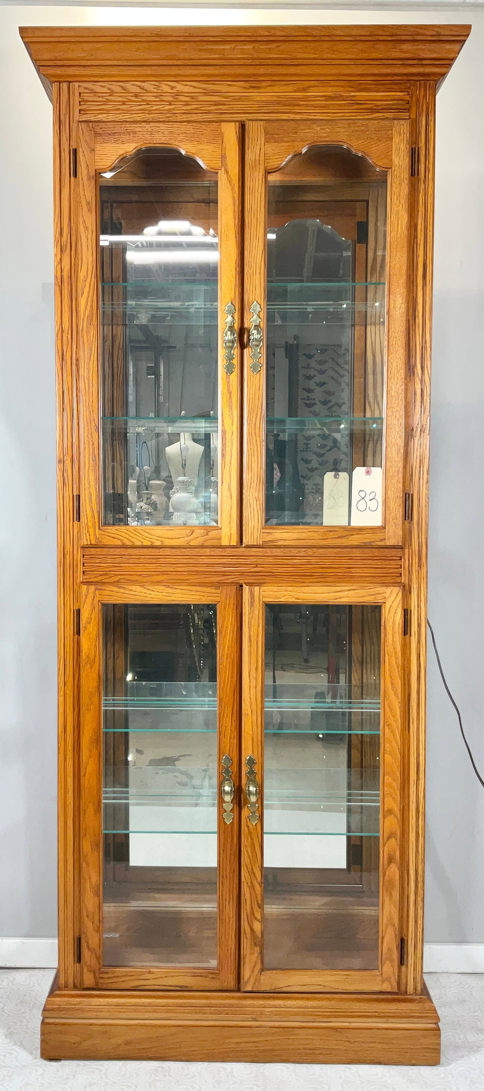 PULASKI FURNITURE OAK MIRRORED BACK LIGHTED DOUBLE DOOR CURIO. (1 of 4)