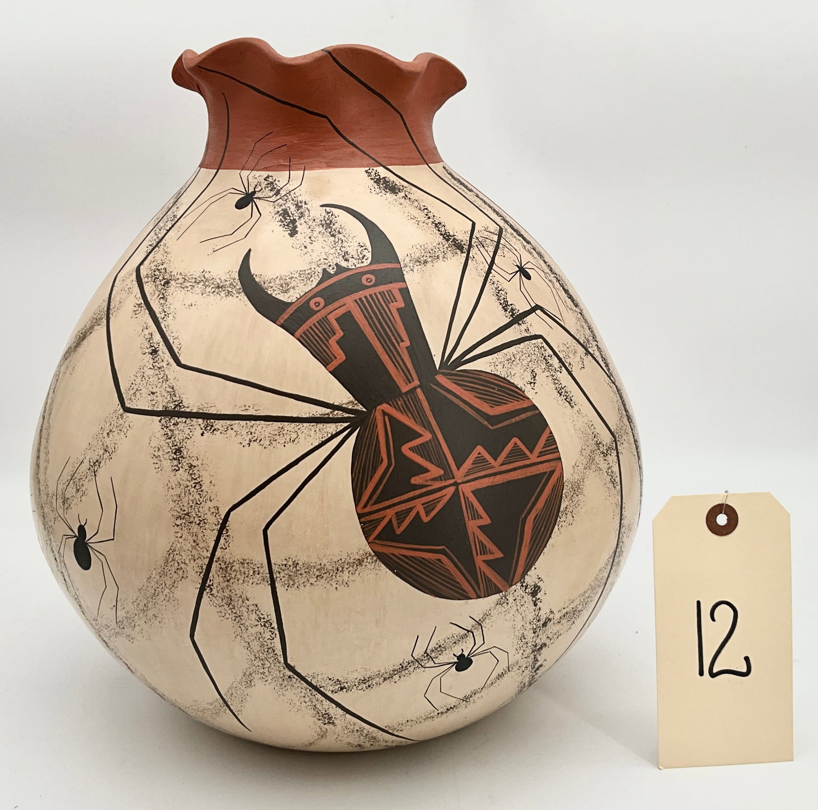 SIGNED SOUTHWESTERN ART POTTERY JUG ENTITLED "SUN AND FIRE": SIGNED SOUTHWESTERN ART POTTERY JUG ENTITLED "SUN AND FIRE" This is a beautiful example of contemporary Native American pottery, specifically a ceramic jug titled "Sun and Fire." The piece showcases t
