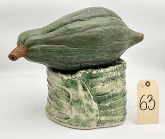 HEAVY ART POTTERY SQUASH/GOURD FIGURE ON PEDESTAL.