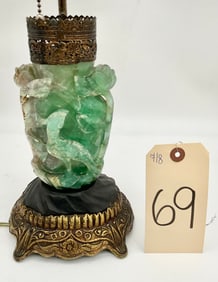 VINTAGE CARVED JADE AND BRASS TABLE LAMP.