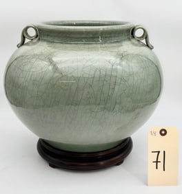 GLAZED ART POTTERY SQUAT VASE WITH WOODEN BASE.