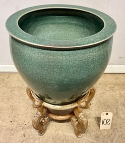 DECORATED POTTERY PLANTER WITH STAND.