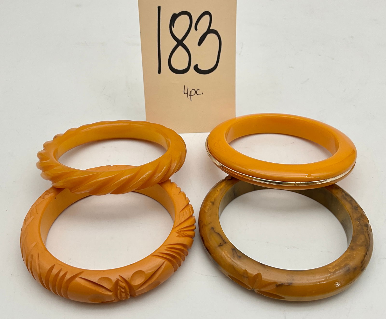 4 PC VINTAGE DECORATED BAKELITE BRACELETS. (1 of 2)