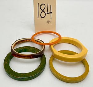 5 PC GREEN, ORANGE, AND YELLOW VINTAGE BAKELITE BRACELETS.