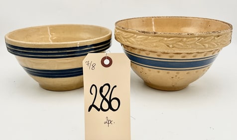 PAIR OF VINTAGE BLUE BANDED RELIEF-MOLDED YELLOWARE BOWLS.