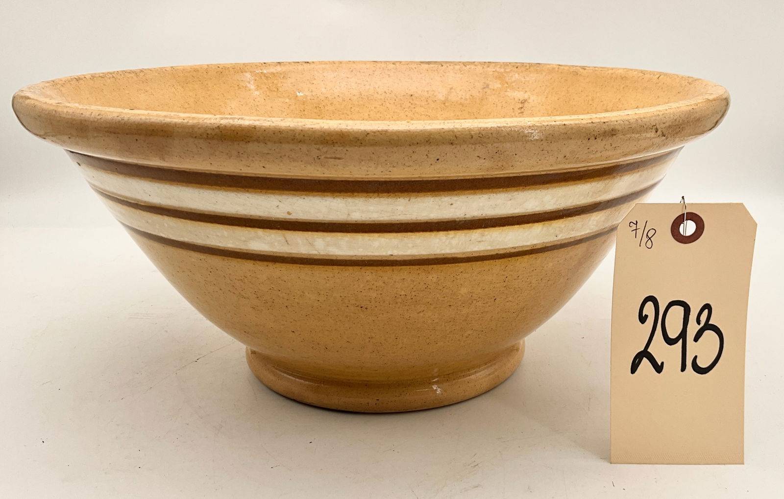 BROWN AND WHITE BANDED YELLOWARE BOWL. (1 of 3)