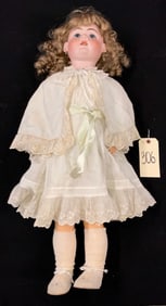ANTIQUE GERMAN MADE JOINTED BISQUE DOLL MARKED DEP.