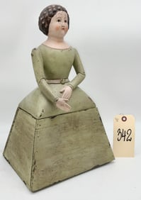 RUSTIC TIN AND WOOD LADY IN DRESS FIGURAL STORAGE BOX.