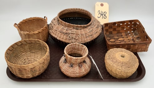 ASSORTED VINTAGE WOVEN BASKETS LOT.