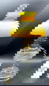 RELIEF MOLDED GLEAR GLASS OIL LAMP WITH CASED AMBER GLASS SHADE, ELECTRIFIED.