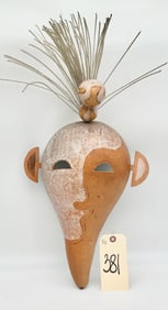 AFRICAN CARVED WOODEN MASK.