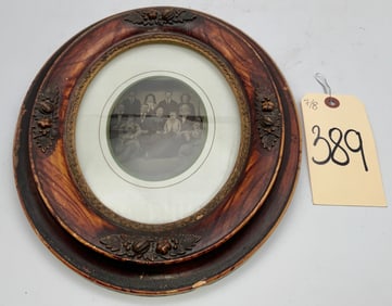 ASA STINEHCOMB FAMILY PHOTOGRAPH DATED 1873 IN CARVED WOODEN FRAME.