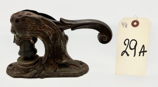 FIGURAL LIONS HEAD STAMP/PRESS.