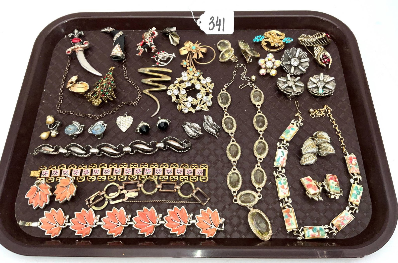 Vintage Jewelry Featuring Pieces Marked Star, Diana, Coro, Freirici, and Trifari: A curated assortment of vintage jewelry pieces, including necklaces, bracelets, brooches, earrings, and pins. Makers include notable names such as Star, Diana, Coro, Freirici, and Trifari. Highlights