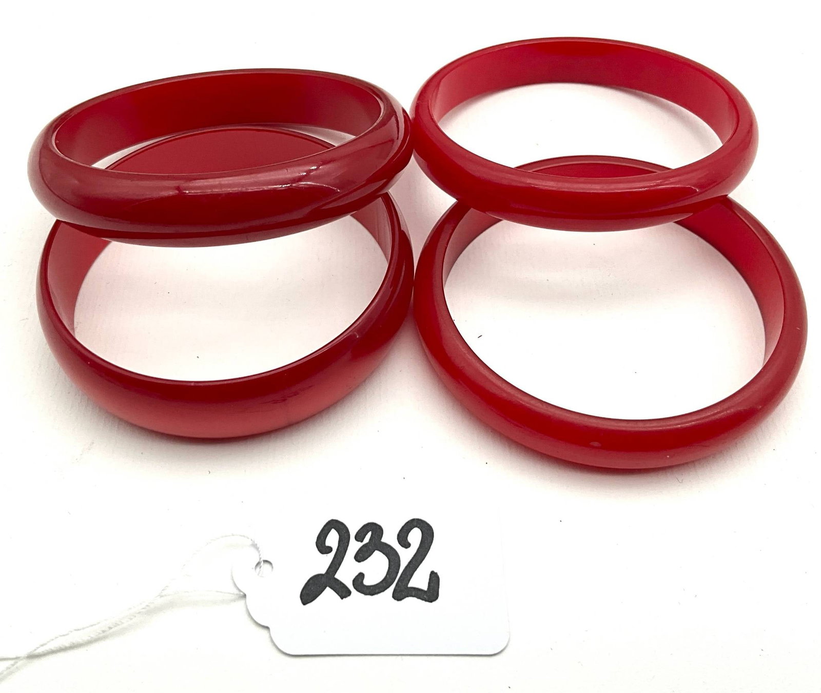 Four Red Bakelite Bangles with 0.5-0.75″ Widths (1 of 2)