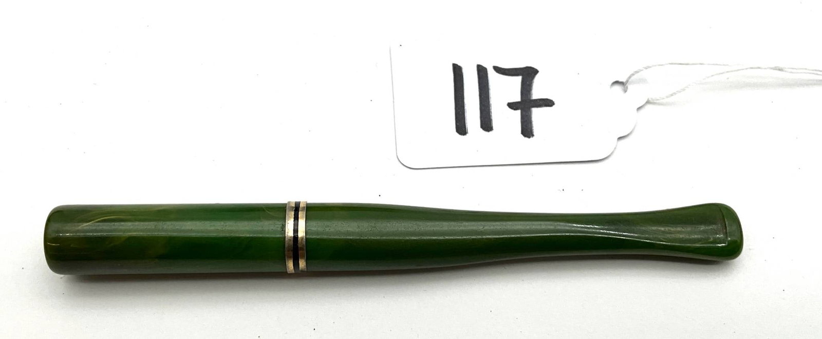 4.25-Inch Green Vintage Cigarette Holder with Metal Ring Trim: This 4.25-inch cigarette holder features a green design with a dual metal ring trim. Made in the early to mid-20th century, it was designed for stylish tobacco use. The piece measures 4.25 inches in l