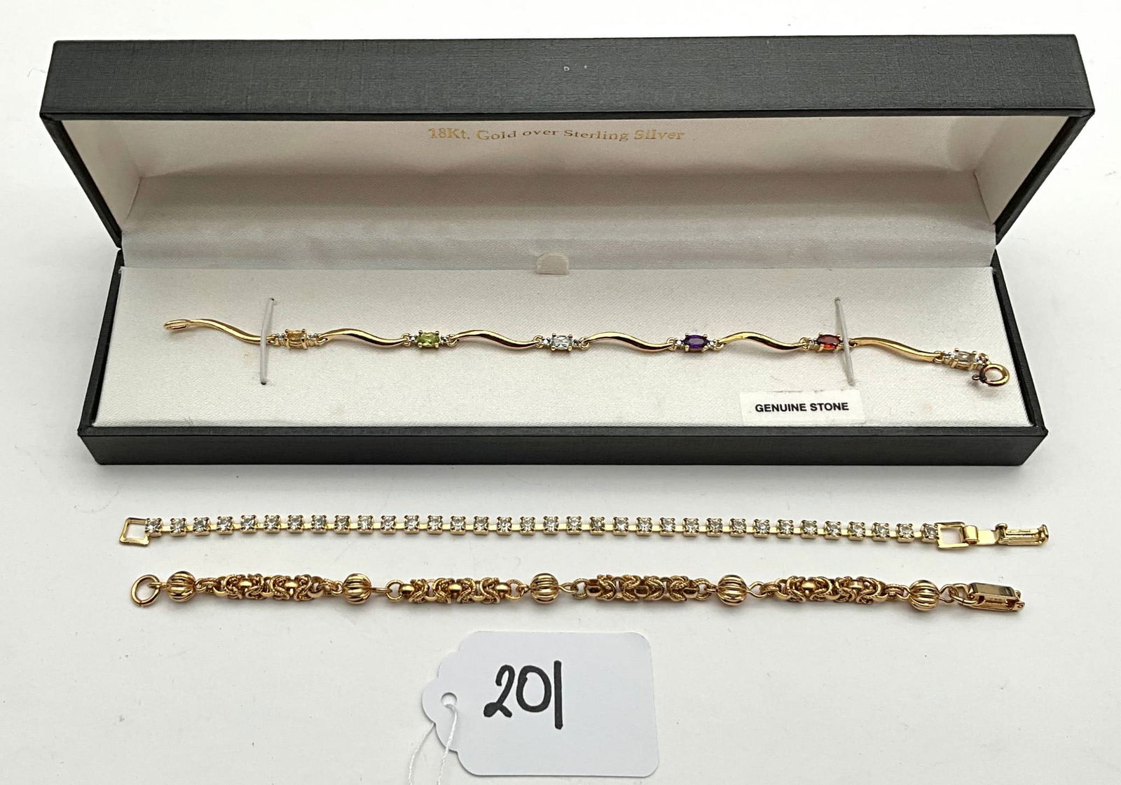 Three Assorted Gold-Tone Bracelets Including Multi-Stone Piece (1 of 4)