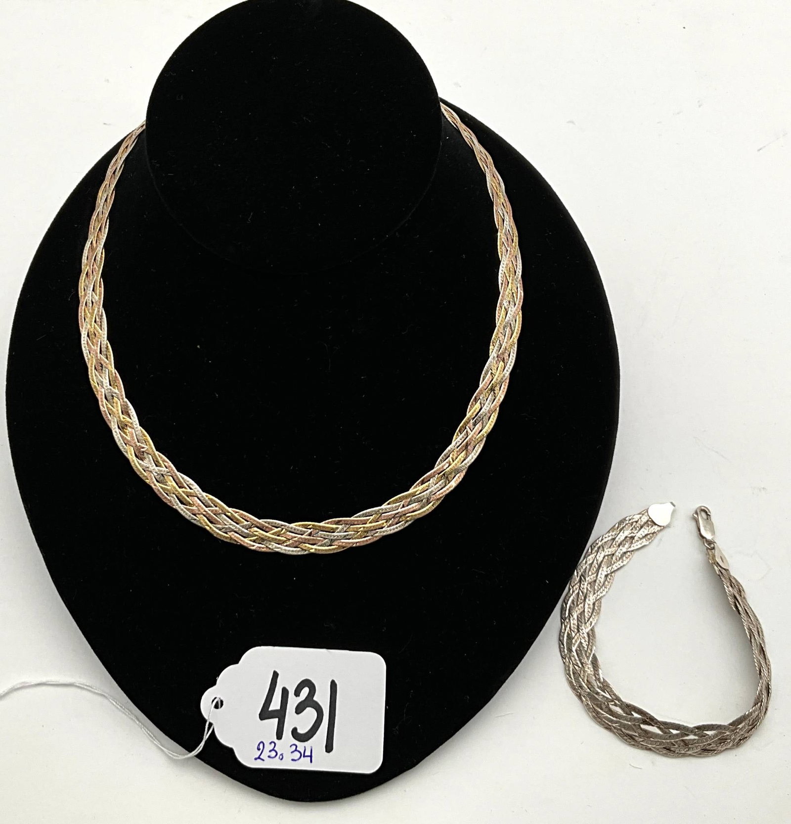 Sterling Silver Necklace and Bracelet Set with Multi-Tone Finish: Sterling silver jewelry set featuring a 16-inch necklace and a 6-inch bracelet. The set has a woven multi-tone design showcasing silver, gold, and palladium shades. The clasps are stamped with '925,'