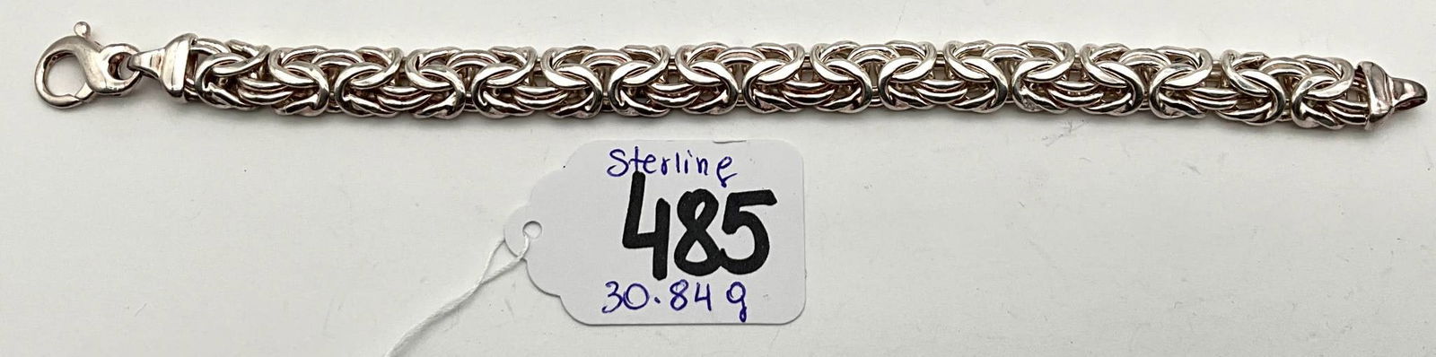 Sterling Silver Bracelet by Milor Italy, 8 Inches Long, 30.84g: Sterling silver bracelet made by Milor Italy. The bracelet weighs 30.84 grams and measures 8 inches in length. It features an intricate design showcasing classic craftsmanship. Suitable for various oc